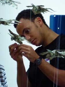 Sipho Mabona installing "The Plague" at JANM, 2012