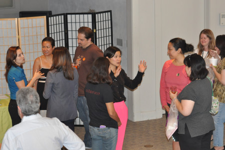Lela Lee excitedly converses with JANM members in an exclusive Meet & Greet.