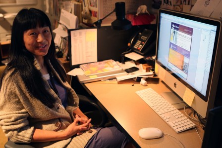 Cindi, JANM's 2013 production intern, designing a event flyer.