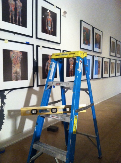 As the photographs are hung