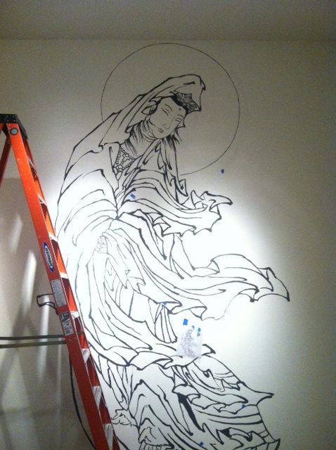 The wall art was painted by hand