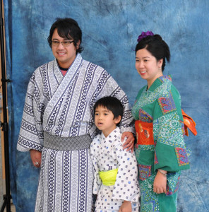 A family poses in traditional garb at JANM's 2013 Natsumatsuri photo booth. Photo: Daryl Kobayashi.