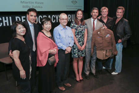 L to R: Aly Morita, Ralph Macchio, JANM Trustee Wendy Shiba, director John Avildsen, JANM New Leadership Advisory Council president Kira Teshima, JANM President and CEO Greg Kimura (holding "Mr. Miyagi's" WWII uniform), Billy Zabka, and Martin Kove. Photo: Russell Kitagawa.