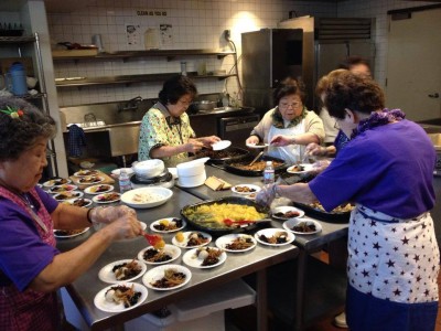 JANM volunteers work hard to prepare the osechi-ryori tasting every year.