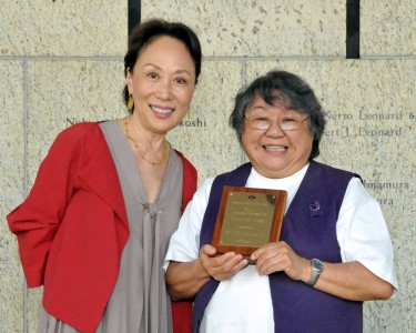 Kitagawa, right, received the 2010 Community Award in recognition of her services as a volunteer.