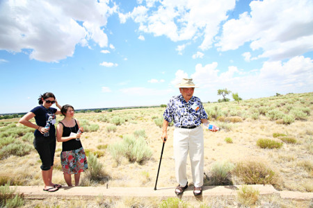 A family returns to the site of their former barrack at Amache. Photo: Tracy Kumono.