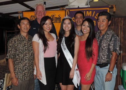 Camryn Sugita, center, is crowned Miss GEO 2015. Surrounding her are four members of the GEO club, along with 2014 Nisei Week Princess Tiffany Hashimoto (left) and 2008 Nisei Week Queen Jill Hiraizumi (right).