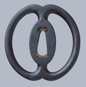 Musashi Miyamoto, tsuba with a design of two sea cucumbers, 1600s, iron.