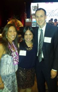 New JANM staff member Mark Robbins, right, attends the Go For Broke National Education Center's 14th Annual Evening of Aloha Gala Dinner with his wife, Iryll Robbins-Umel, center. At left is keynote speaker and pioneering Asian American athlete Natalie Nakase.