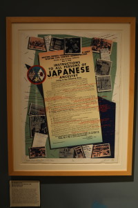 Qris Yamashita's silkscreen poster, Redress/Reparations Now!/Little Tokyo. Photo by Gary Ono.