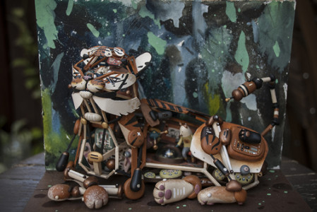 Sean Chao, Big Cat, 2015, bass wood, polymer clay, acrylic, and gouache paint on wood panel. Photo courtesy of the artist.