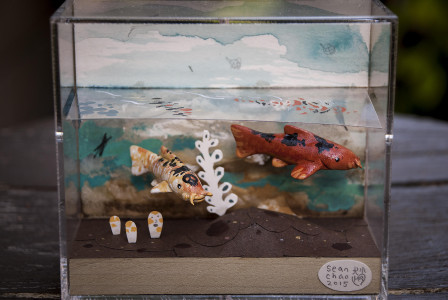 Learn to make a piece like this in this weekend's Water Memory workshop. Sean Chao, Skull Koi 2, 2015, bass wood, polymer clay, acrylic, and gouache paint on wood panel. Photo courtesy of the artist.