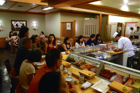 At the sushi bar.