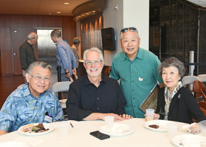 Dennis Reed (second from left) with Sadao Kimura, Alan Miyatake, and Minnie Takahashi at a special private luncheon held for family members of the photographers featured in Making Waves. Photo by Nobuyuki Okada.