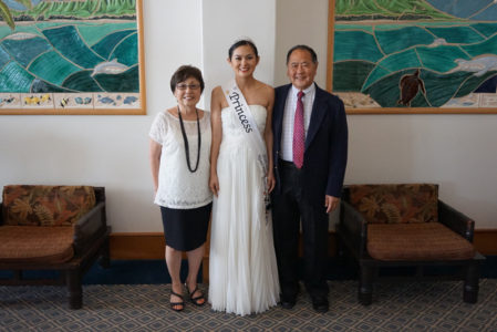 Princess Camryn Sugita with her parents at the New Otani Kaimana Beach Hotel.