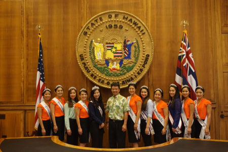 The 2015 Nisei Week Court and the 2015 Northern California Cherry Blossom Festival Court visit Lieutenant Governor Shan Tsutsui at the Hawai‘i State Capitol.