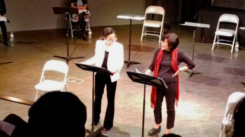 Tamlyn Tomita as Mr. White, with Sharon Omi as Joe Cabot.